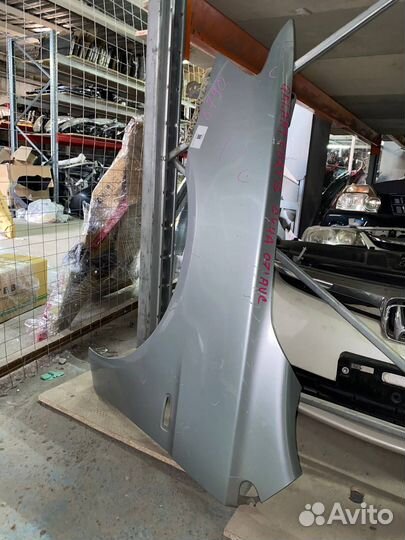 Крыло левое переднее Mitsubishi lancer 10