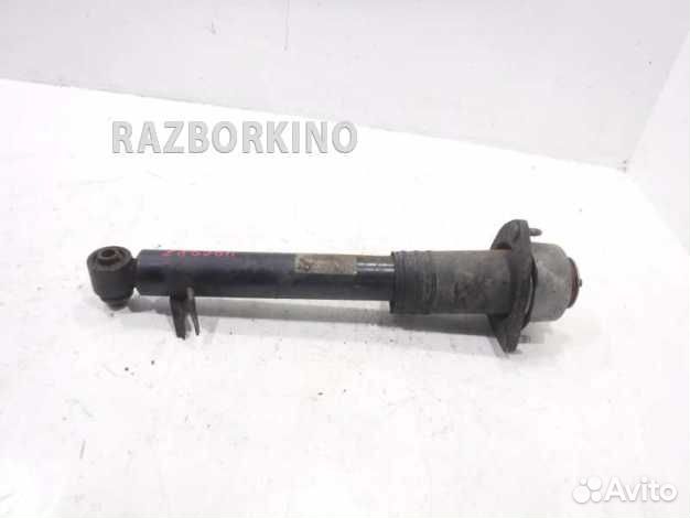 Амортизатор задний левый