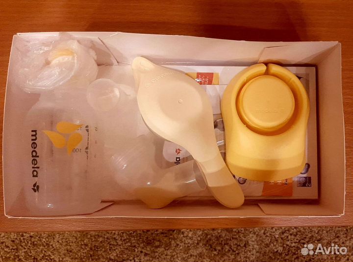 Молокоотсос medela