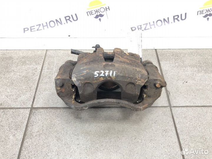 Суппорт тормозной передний левый Kia Ceed хэтчбек