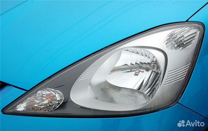Стекло левой фары Honda Fit 2 GE GP 2007-2014