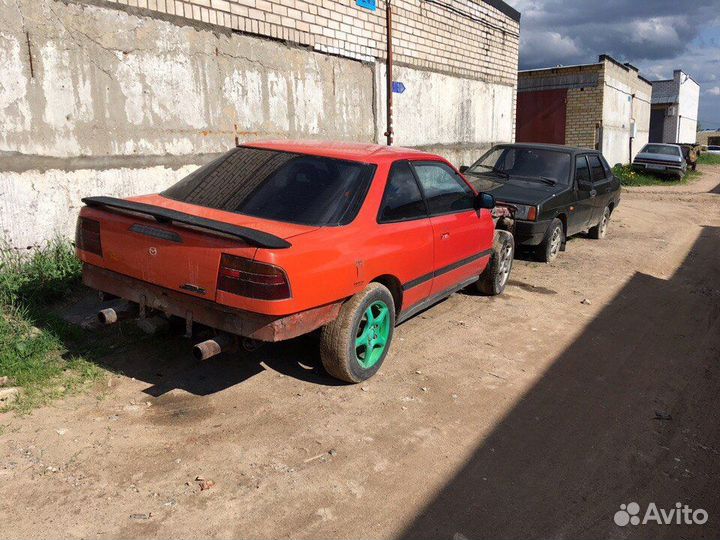 Стекло двери Mazda 626 (GD) Купе