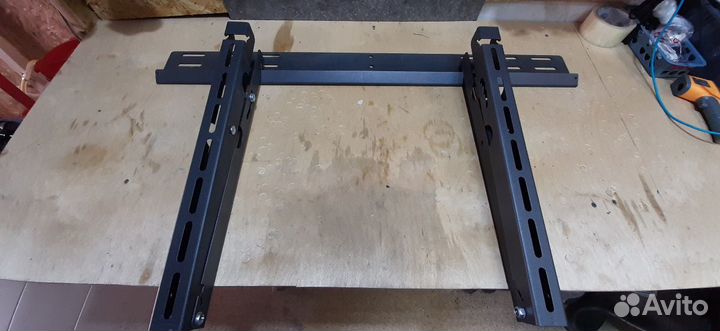 Крепление телевизора стену