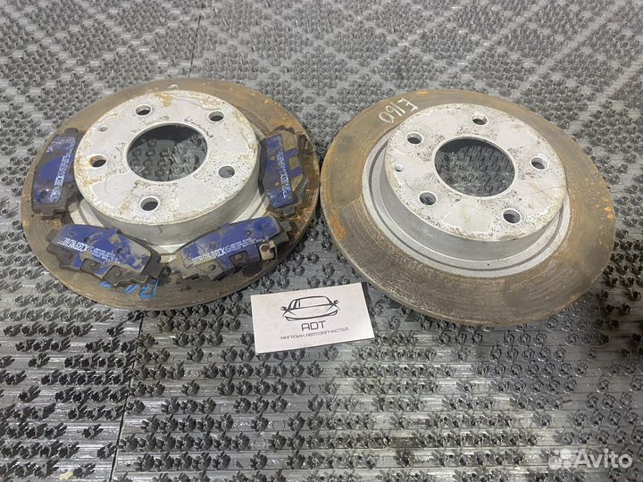 Комплект задних дисков и колодок Mazda 3 BM