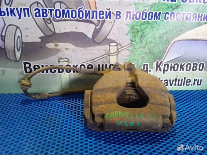 Суппорт передний правый Volkswagen Caravelle T-5