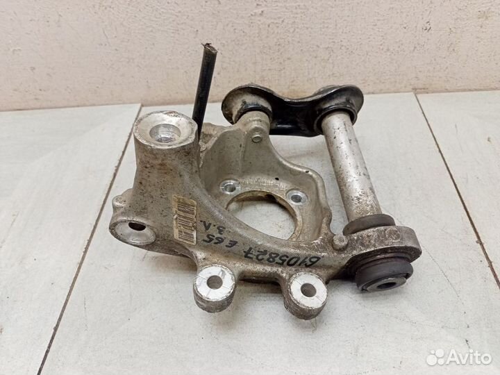 Кулак задний левый бмв