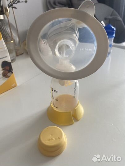 Молокоотсос medela ручной + пакеты