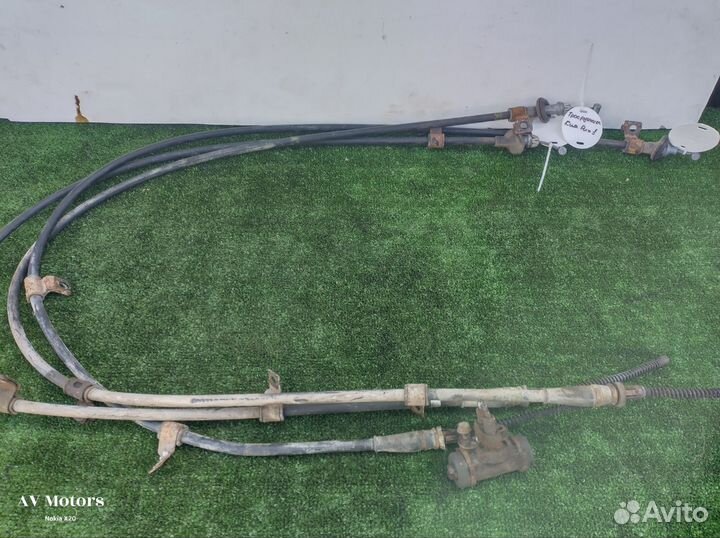 Трос ручного тормоза Kia Rio 1
