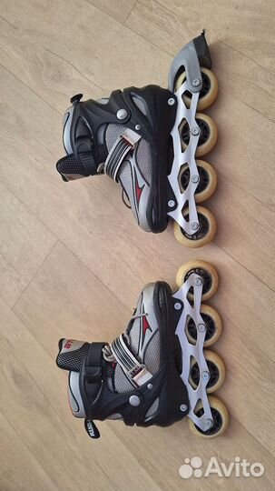 Роликовые коньки