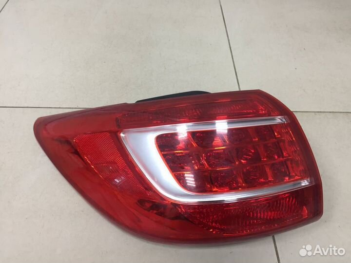 Фонарь задний наружный левый Kia Sportage