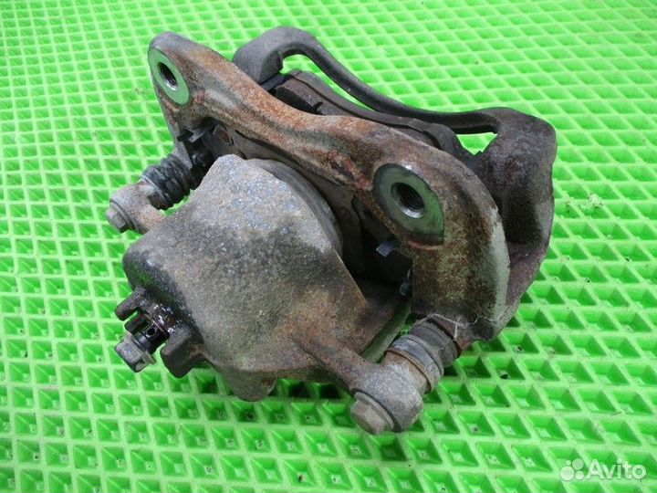 Суппорт передний левый Kia Rio 3 (UB\QB)