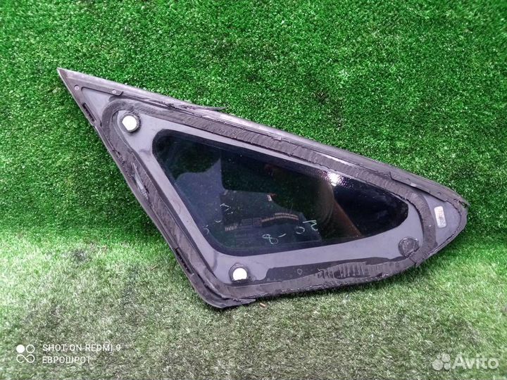 Стекло кузовное глухое левое Opel Astra J (2010-2