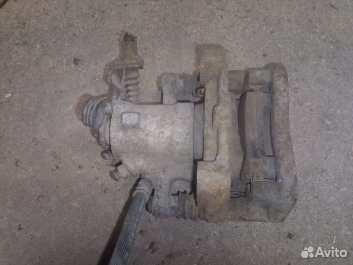 Суппорт тормозной передний, задний Опель Мерива