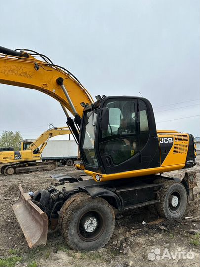 Колёсный экскаватор JCB JS 160W, 2012