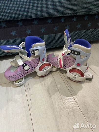 Роликовые коньки