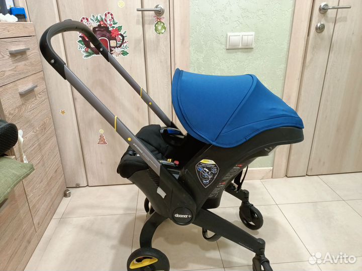 Коляска автокресло doona с базой isofix