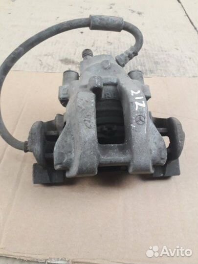 Суппорт тормозной задний левый Mercedes-Benz