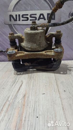 Суппорт тормозной перед nissan teana J32 Прав