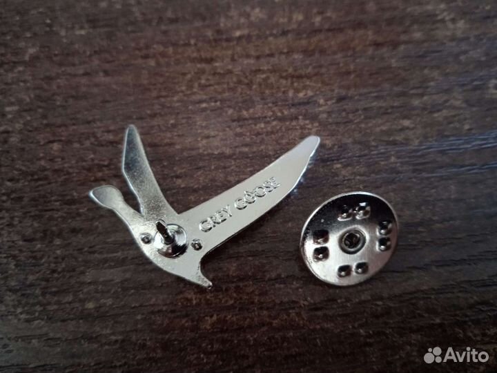 Фирменный значок бренда grey goose