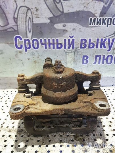 Суппорт тормозной передний левый Mazda 6