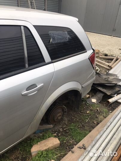 Заднее левое крыло на opel astra H универсал