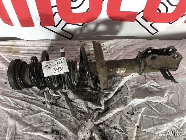 Амортизатор передний левый Opel Astra J До Рестайл