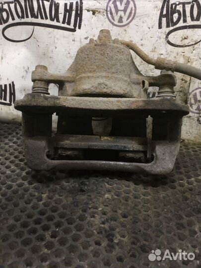 Суппорт передний правый Hyundai Solaris седан G4FA