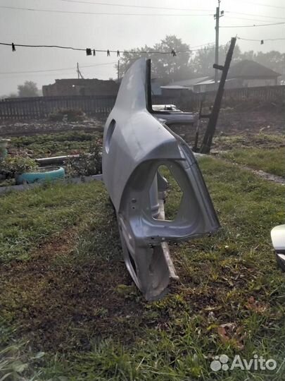 Крыло заднее левое Тойота corolla 120