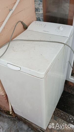 Стиральная машина с вертикальной загрузкой