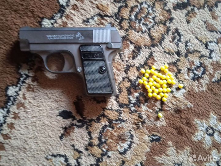 Игрушечный пистолет