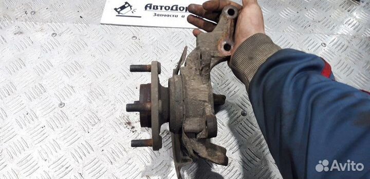 Кулак поворотный передний правый под ABS Almera