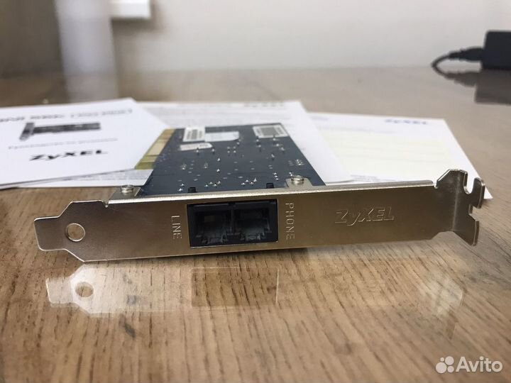 Модем Zyxel omni 56k pci plus