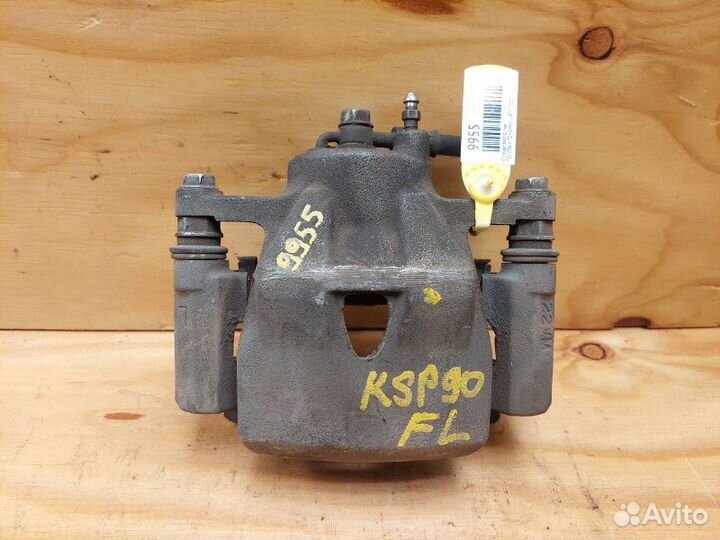 Суппорт передний левый Toyota Vitz KSP90 1krfe