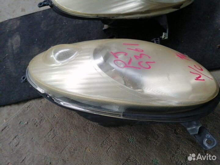 Фара Nissan March K12