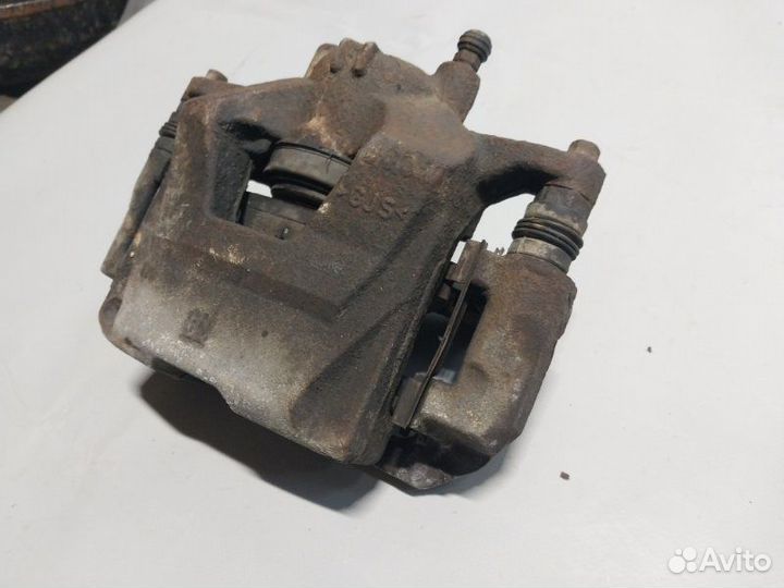 Суппорт тормозной передний левый Chevrolet Cruze