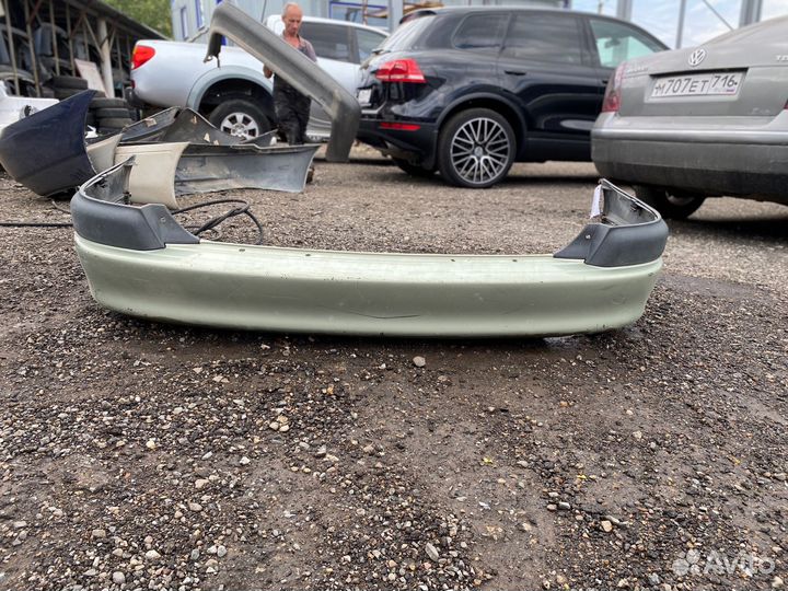 Бампер задний Toyota Avensis 1997г. (универсал)