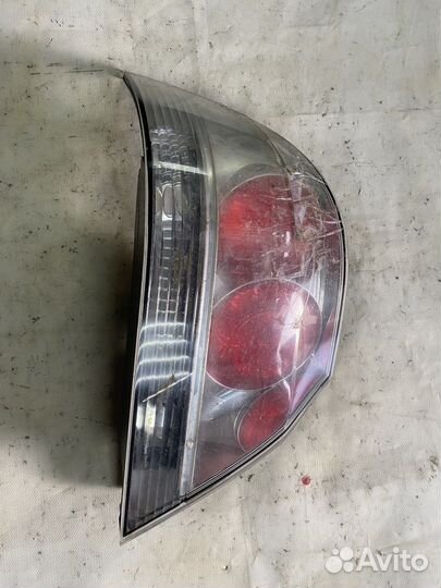 Фонарь задний левый Lancer 9