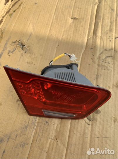 Фонарь левый в крышку багажника Kia Cerato 2