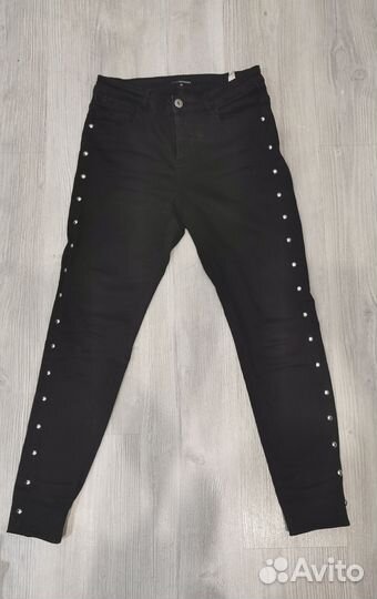 Джинсы с клёпками