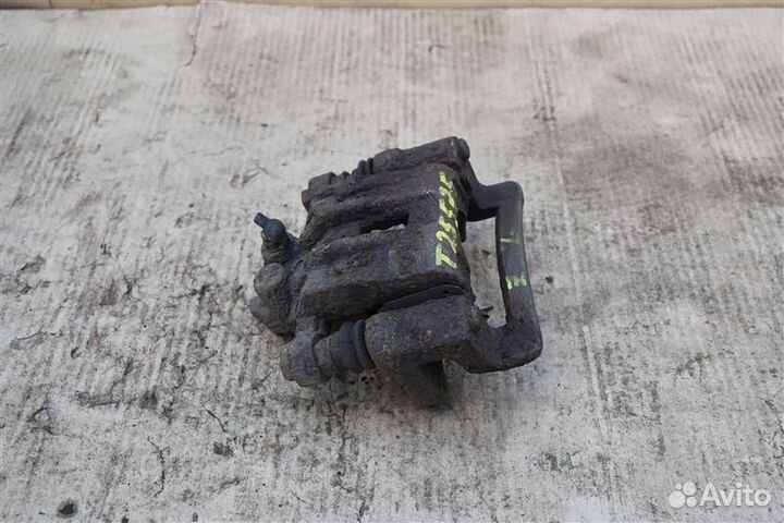 Суппорт тормозной задний левый Kia Sportage 2