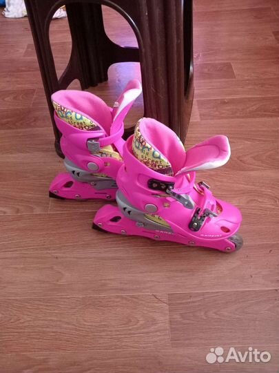 Роликовые коньки