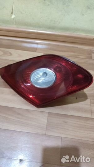 Фонарь в крышку багажника passat cc