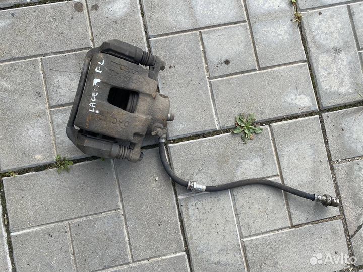 Тормозной суппорт передний левый Chevrolet Lacetti