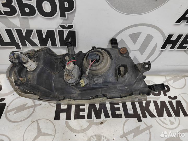 Фара Mitsubishi Pajero Sport 1 до рест