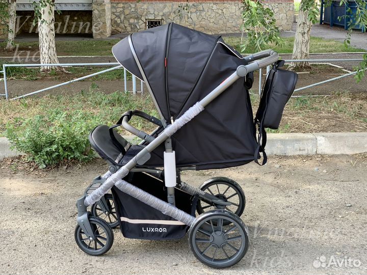 Прогулочная коляска с большими колесами