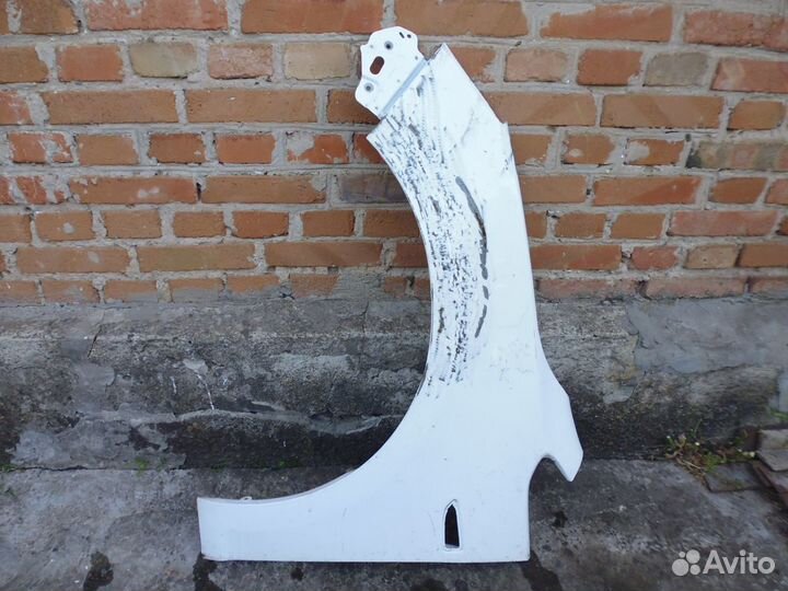 Опель Астра J 5D крыло переднее левое с 2009