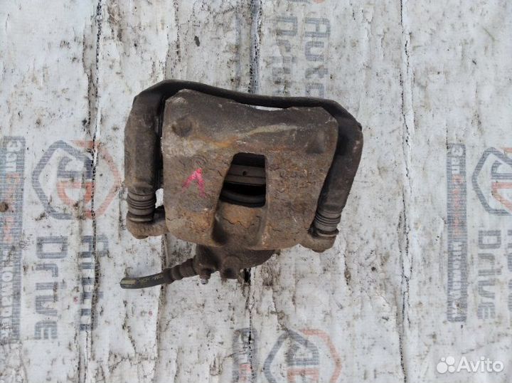 Суппорт тормозной передний левый Fiat Albea 1.4
