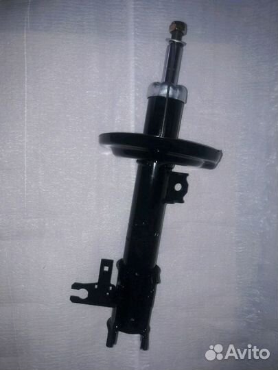 Амортизатор передний Opel Astra H