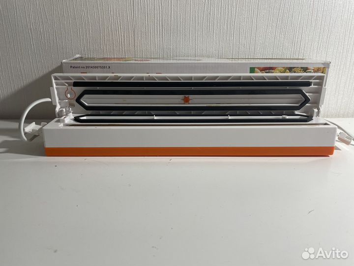 Вакуумная упаковочная машина