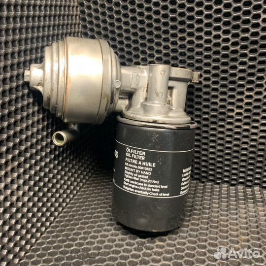 Кронштейн масляного фильтра Nissan Sunny Y10 CD20